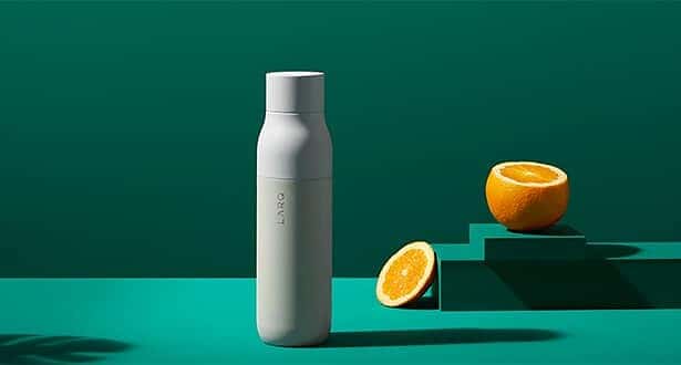 High-quality water bottle with orange slices for a refreshing look.