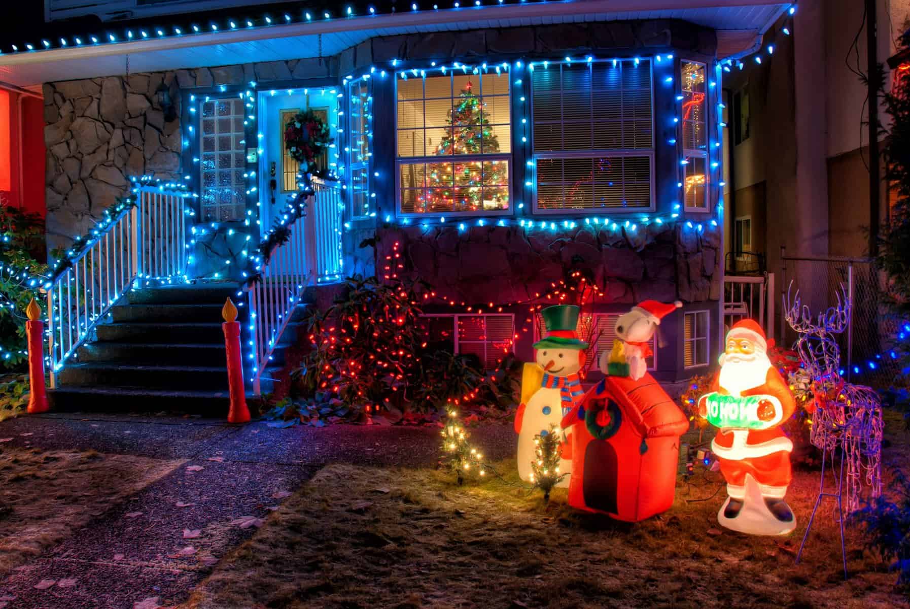Bright Christmas lights brighten up the house exterior during the holiday season.
